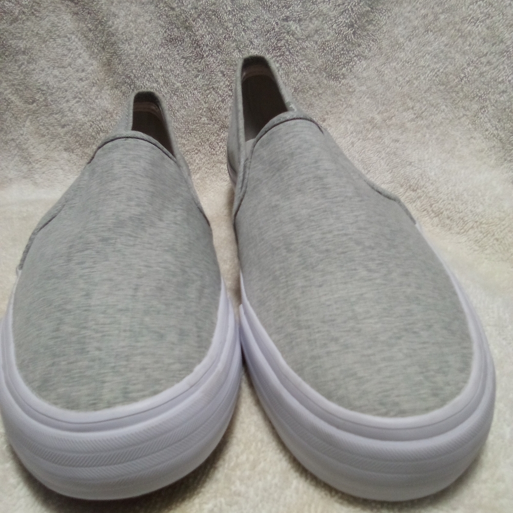 A light gray pair of keds sneakers slip-ons new without box